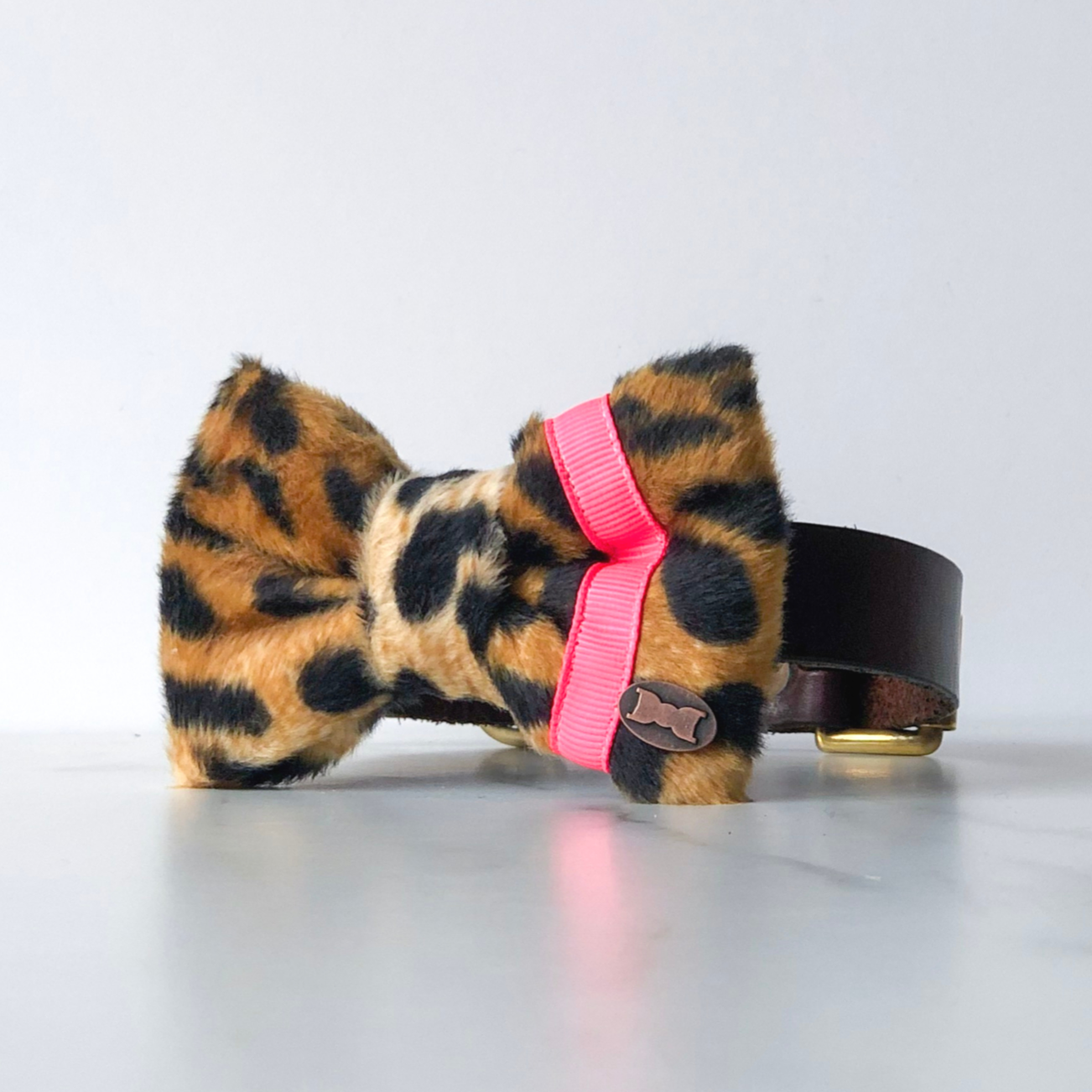 Neon pink and leopard dog bow tie in small